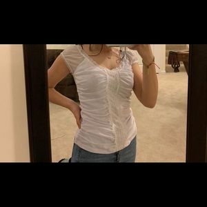 Cute white ruffled blouse!